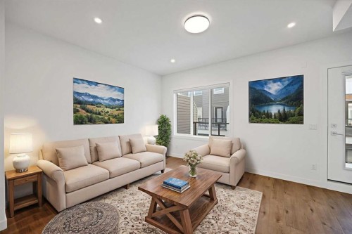 1403-280 Chelsea Road, Chestermere, AB - Indoor Photo Showing Living Room