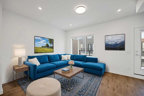 1403-280 Chelsea Road, Chestermere, AB - Indoor Photo Showing Living Room