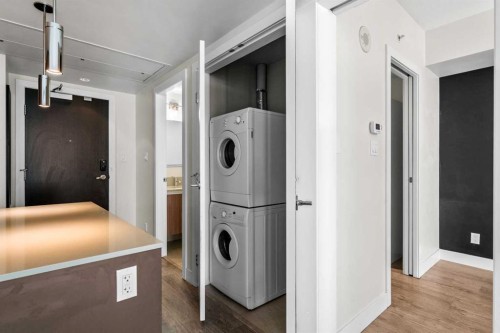 1403-1122 3 Street Se, Calgary, AB - Indoor Photo Showing Laundry Room