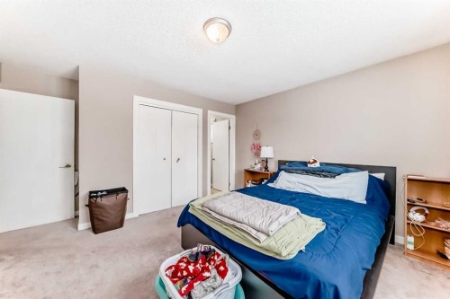 503 Woodbine Boulevard Sw, Calgary, AB - Indoor Photo Showing Bedroom