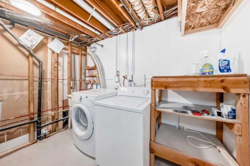 503 Woodbine Boulevard Sw, Calgary, AB - Indoor Photo Showing Laundry Room