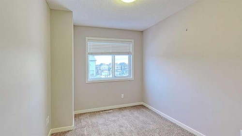 302-70 Saddlestone Drive Ne, Calgary, AB - Indoor Photo Showing Other Room
