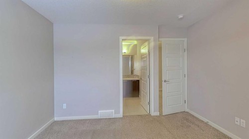 302-70 Saddlestone Drive Ne, Calgary, AB - Indoor Photo Showing Other Room