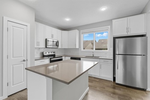 167 Highview Gate Se, Airdrie, AB - Indoor Photo Showing Kitchen With Stainless Steel Kitchen