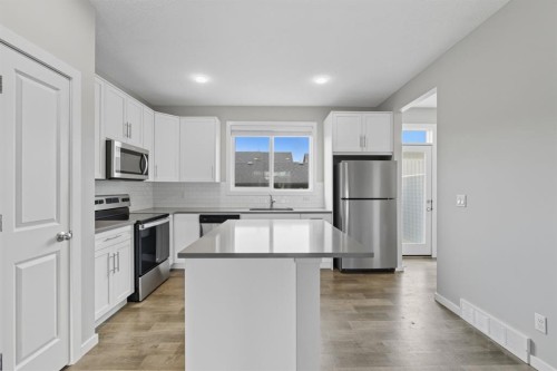167 Highview Gate Se, Airdrie, AB - Indoor Photo Showing Kitchen With Stainless Steel Kitchen