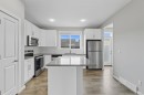 167 Highview Gate Se, Airdrie, AB  - Indoor Photo Showing Kitchen With Stainless Steel Kitchen 