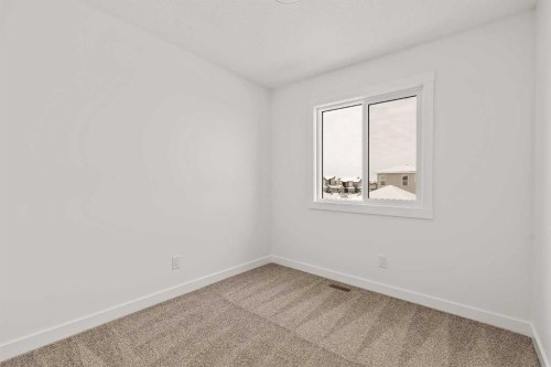 15 Herron Walk Ne, Calgary, AB - Indoor Photo Showing Other Room