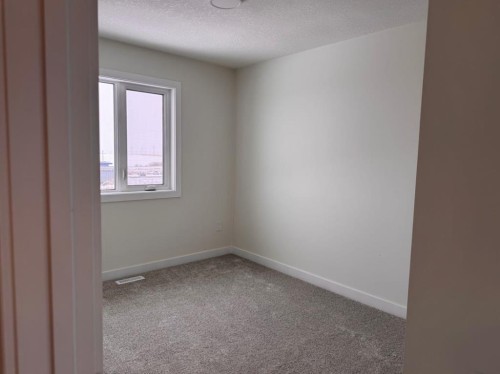 1923 Mccaskill Drive, Crossfield, AB - Indoor Photo Showing Other Room