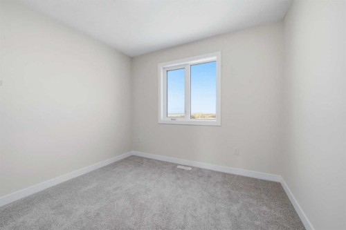 1923 Mccaskill Drive, Crossfield, AB - Indoor Photo Showing Other Room