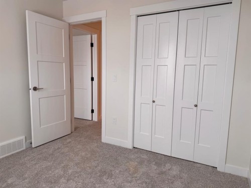 1923 Mccaskill Drive, Crossfield, AB - Indoor Photo Showing Other Room