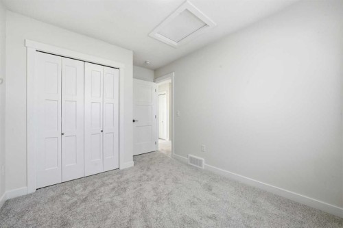 1923 Mccaskill Drive, Crossfield, AB - Indoor Photo Showing Other Room