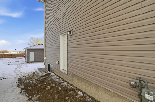1923 Mccaskill Drive, Crossfield, AB - Outdoor With Exterior