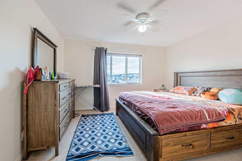 9249 Saddlebrook Drive Ne, Calgary, AB - Indoor Photo Showing Bedroom