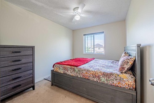 9249 Saddlebrook Drive Ne, Calgary, AB - Indoor Photo Showing Bedroom