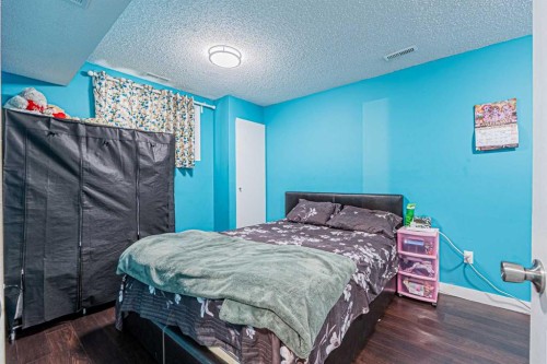 9249 Saddlebrook Drive Ne, Calgary, AB - Indoor Photo Showing Bedroom