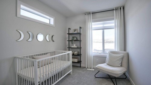 750 Wolf Willow Boulevard Se, Calgary, AB - Indoor Photo Showing Bedroom