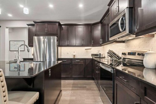 271 Chelsea Heath, Chestermere, AB - Indoor Photo Showing Kitchen With Stainless Steel Kitchen With Upgraded Kitchen