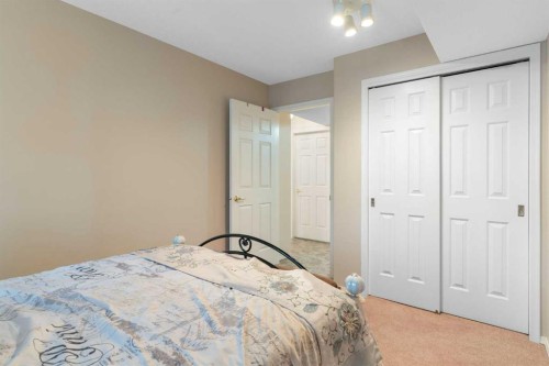 1209-1209 Sienna Park Green Sw, Calgary, AB - Indoor Photo Showing Bedroom