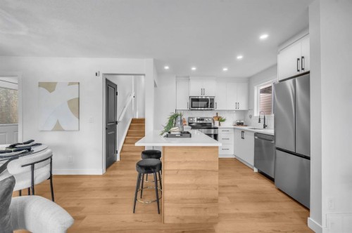 5747 24 Avenue Ne, Calgary, AB - Indoor Photo Showing Kitchen With Stainless Steel Kitchen