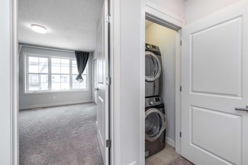 40 Sherwood Row Nw, Calgary, AB - Indoor Photo Showing Laundry Room