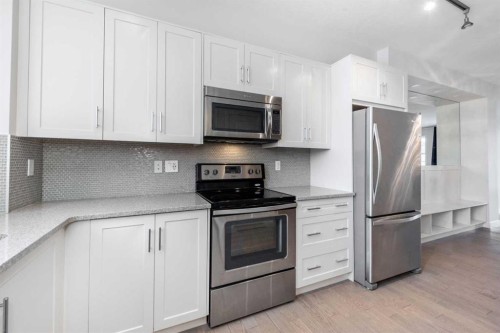 40 Sherwood Row Nw, Calgary, AB - Indoor Photo Showing Kitchen With Stainless Steel Kitchen With Upgraded Kitchen
