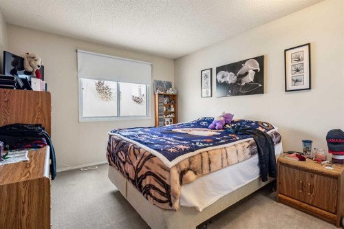 6496 54 Street Ne, Calgary, AB - Indoor Photo Showing Bedroom