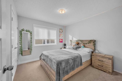 17 Cornerstone Manor Ne, Calgary, AB - Indoor Photo Showing Bedroom