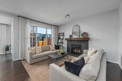 63 Auburn Glen Heights Se, Calgary, AB - Indoor Photo Showing Living Room With Fireplace