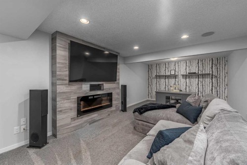 63 Auburn Glen Heights Se, Calgary, AB - Indoor With Fireplace