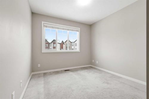 5 Copperstone Villas Se, Calgary, AB - Indoor Photo Showing Other Room