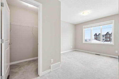 5 Copperstone Villas Se, Calgary, AB - Indoor Photo Showing Other Room