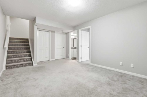 5 Copperstone Villas Se, Calgary, AB - Indoor Photo Showing Other Room