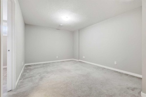 5 Copperstone Villas Se, Calgary, AB - Indoor Photo Showing Other Room