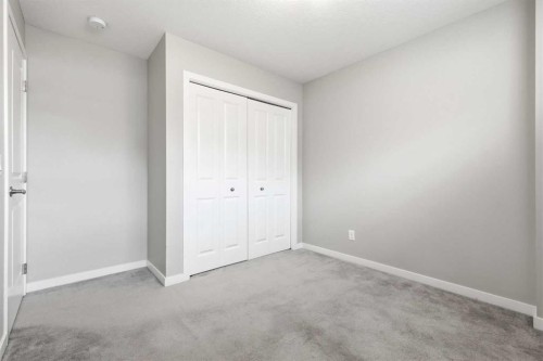 5 Copperstone Villas Se, Calgary, AB - Indoor Photo Showing Other Room