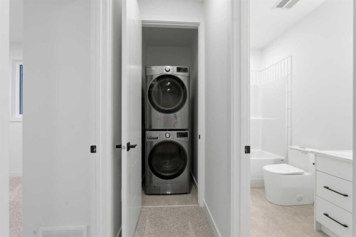212 32 Avenue Ne, Calgary, AB - Indoor Photo Showing Laundry Room
