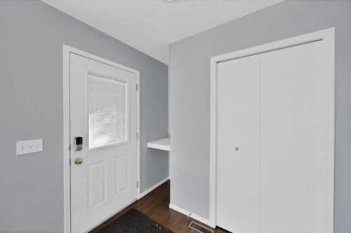 73 Hidden Spring Green Nw, Calgary, AB - Indoor Photo Showing Other Room