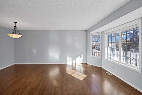 73 Hidden Spring Green Nw, Calgary, AB - Indoor Photo Showing Other Room