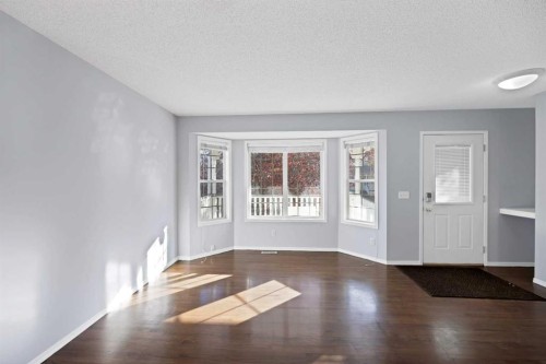 73 Hidden Spring Green Nw, Calgary, AB - Indoor Photo Showing Other Room