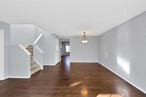 73 Hidden Spring Green Nw, Calgary, AB - Indoor Photo Showing Other Room