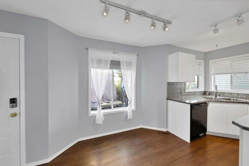 73 Hidden Spring Green Nw, Calgary, AB - Indoor Photo Showing Kitchen