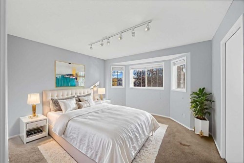 73 Hidden Spring Green Nw, Calgary, AB - Indoor Photo Showing Bedroom