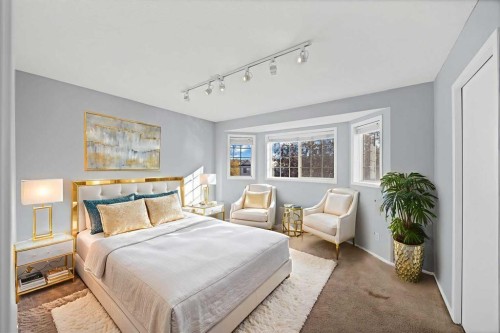 73 Hidden Spring Green Nw, Calgary, AB - Indoor Photo Showing Bedroom