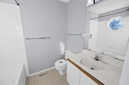73 Hidden Spring Green Nw, Calgary, AB - Indoor Photo Showing Bathroom