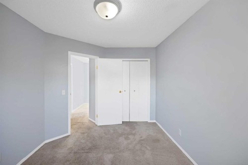 73 Hidden Spring Green Nw, Calgary, AB - Indoor Photo Showing Other Room