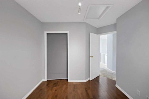 73 Hidden Spring Green Nw, Calgary, AB - Indoor Photo Showing Other Room