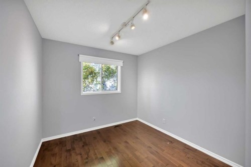 73 Hidden Spring Green Nw, Calgary, AB - Indoor Photo Showing Other Room