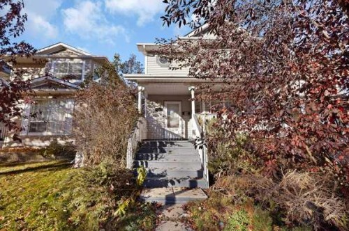 73 Hidden Spring Green Nw, Calgary, AB - Outdoor