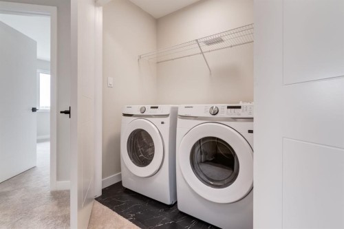 303 Sora Terrace Se, Calgary, AB - Indoor Photo Showing Laundry Room