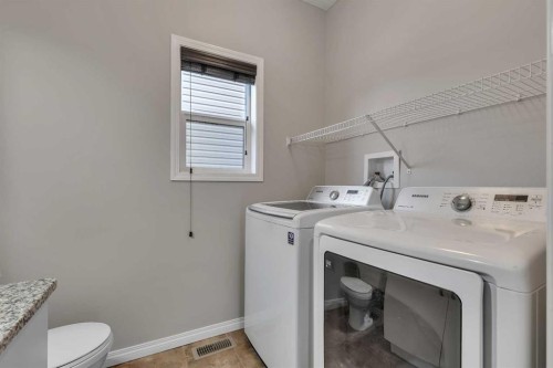 58 Nolanfield Heights Nw, Calgary, AB - Indoor Photo Showing Laundry Room