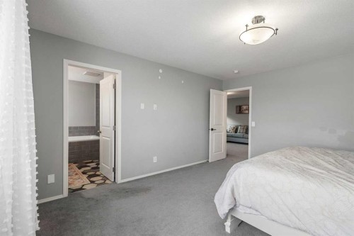 1464 Livingston Way Ne, Calgary, AB - Indoor Photo Showing Bedroom
